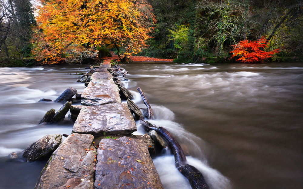 Photograph by Mark Asprey of Tarr Steps, an ancient river crossing in the Exmoor National Park.